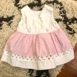 Sleeveless wrap dress with pink striped skirt